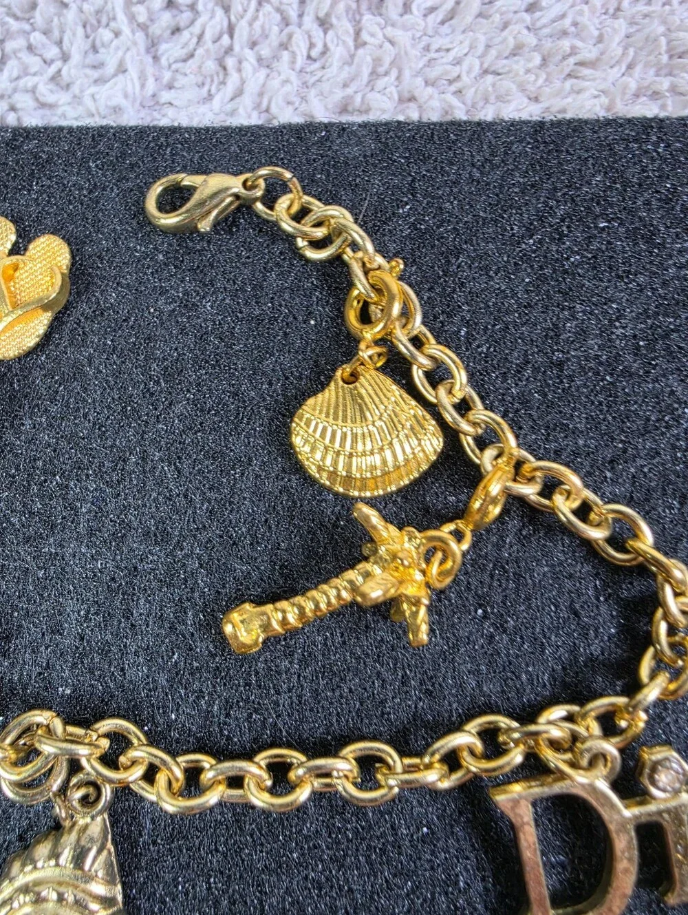 Gold Charm Bracelet with 'Di' Letter and Sea-themed Charms